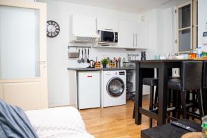 Kuchyň nebo kuchyňský kout v ubytování Le castel