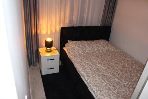 Postel nebo postele na pokoji v ubytování Apartament Euro Bytom