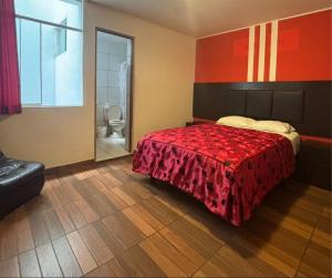 Postel nebo postele na pokoji v ubytování Hostal POSADA LA TABITA
