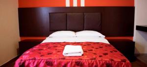 Postel nebo postele na pokoji v ubytování Hostal POSADA LA TABITA
