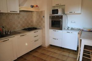 Køkken eller tekøkken på Vacanza relax Isola d'Elba