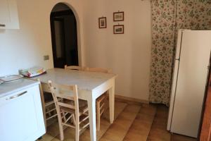 Køkken eller tekøkken på Vacanza relax Isola d'Elba + 21 billeder