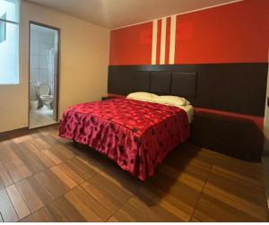 Postel nebo postele na pokoji v ubytování Hostal POSADA LA TABITA + 6 fotografií