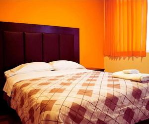 Postel nebo postele na pokoji v ubytování Hostal POSADA LA TABITA
