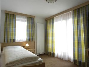 Ένα ή περισσότερα κρεβάτια σε δωμάτιο στο Chalet Susi