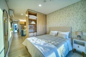 Postel nebo postele na pokoji v ubytování Estudio Deluxe Houze