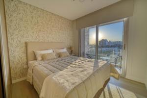 Postel nebo postele na pokoji v ubytování Estudio Deluxe Houze + 25 fotografií
