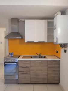 Køkken eller tekøkken på Alice Apartments