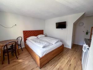 Ένα ή περισσότερα κρεβάτια σε δωμάτιο στο stattHotel