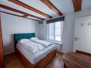 Ένα ή περισσότερα κρεβάτια σε δωμάτιο στο stattHotel