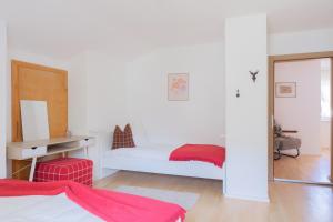 A bed or beds in a room at Haus Capella