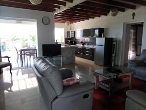 Kuchyň nebo kuchyňský kout v ubytování Kote mer Villa Bayside