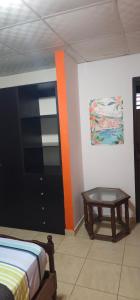 Postel nebo postele na pokoji v ubytování Cuartos independientes con baño privado - Casa La Dolce Vita Las Tablas