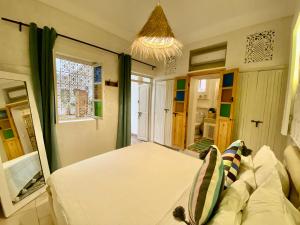 Letto o letti in una camera di Riad Green Vines
