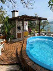 Kolam renang di atau dekat dengan Apto 2 - com Jacuzzi e Vista Mar - Morada do Ganso Bombinhas