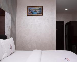 Krevet ili kreveti u jedinici u okviru objekta Formula 2 Hotels and Suites