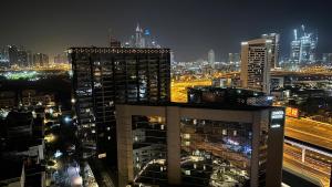 Nespecifikovaný výhled na destinaci Dubaj nebo výhled na město při pohledu z ubytování v soukromí