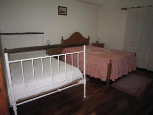 Ένα ή περισσότερα κρεβάτια σε δωμάτιο στο Residencial Mira-Sol