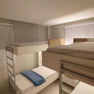 Giường trong phòng chung tại Eco Resort Carneiros Flat Colina +17 ảnh
