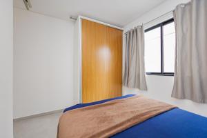 Postel nebo postele na pokoji v ubytování 150m da praia em um fantástico edifício em Balneário Piçarras