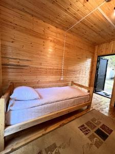 Postel nebo postele na pokoji v ubytování Центр отдыха "DOMIKI"