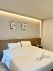 Bedter Hotel Phang Nga客房内的一张或多张床位