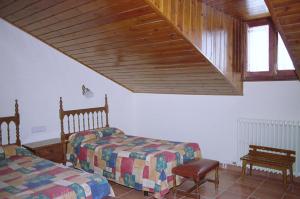 Postel nebo postele na pokoji v ubytování Hostal Fondevila