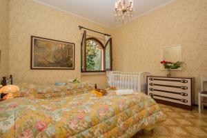 Daller Bianca Apartment by Wonderful Italy tesisinde bir odada yatak veya yataklar