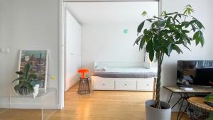 Телевизор и/или развлекательный центр в Appt 2 Chambres Vue Tour Eiffel