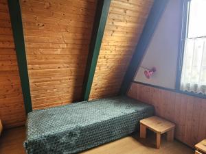 Ein Bett oder Betten in einem Zimmer der Unterkunft Ferienhaus 196 in Fedderwardersiel