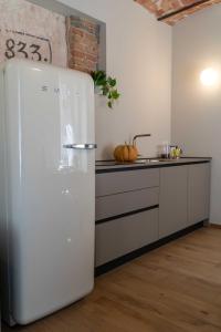 Kuchyň nebo kuchyňský kout v ubytování CENTRO STORICO - Alfieri Luxury Apartment + 4 fotografie