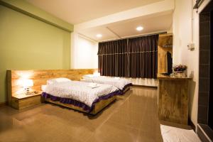 Ένα ή περισσότερα κρεβάτια σε δωμάτιο στο BB&B Hotel