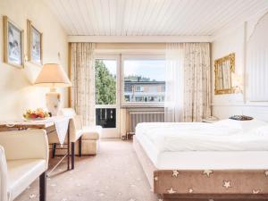 Posteľ alebo postele v izbe v ubytovaní Genuss - und Vitalhotel Moisl