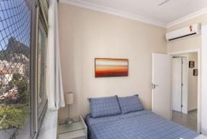Ein Bett oder Betten in einem Zimmer der Unterkunft Botafogo 2qts - moderno e sofisticado com vaga