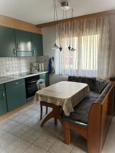 Kuchyň nebo kuchyňský kout v ubytování Residenz Darianne Leukerbad
