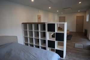 Postel nebo postele na pokoji v ubytování Tinyhouse