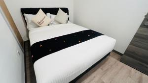 Postel nebo postele na pokoji v ubytování Agile TRX Luxury suite Bukit bintang