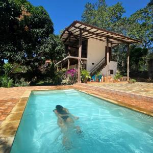 Bazén v ubytování Hostal Villa San Rafael nebo v jeho okolí