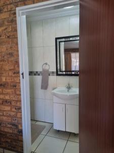 Koupelna v ubytování Emerald Guesthouse