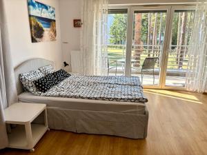 Postel nebo postele na pokoji v ubytování Apartament Jula 1