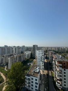 an aerial view of a city with tall buildings at Ostoja Metro Bródno Warszawa in Warsaw