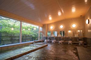 Bazén v ubytování arts-inn アーツイン 伊豆高原天然温泉旅馆 艺家 nebo v jeho okolí
