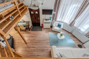 an overhead view of a living room and dining room at Mirage Apartments Váci Street in Budapest