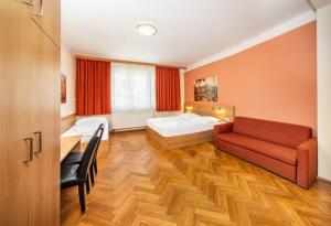 Postel nebo postele na pokoji v ubytování Residence BENE