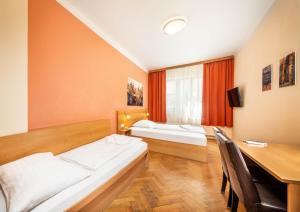 Postel nebo postele na pokoji v ubytování Residence BENE