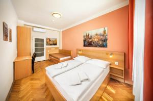Postel nebo postele na pokoji v ubytování Residence BENE