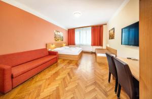 Postel nebo postele na pokoji v ubytování Residence BENE