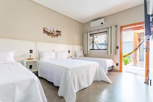 Ένα ή περισσότερα κρεβάτια σε δωμάτιο στο Casa c/ Piscina e 04 Suítes – 5 Min. do Centro +35 φωτογραφίες