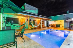 Πισίνα στο ή κοντά στο Casa c/ Piscina e 04 Suítes – 5 Min. do Centro