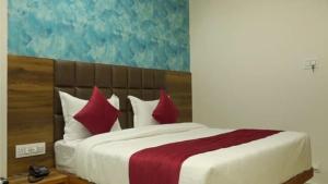 Hotel Rk Arcade客房内的一张或多张床位